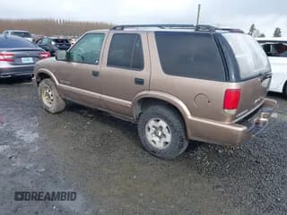 ✅ 2004 Chevrolet Blazer LS • VIN: 1GNDT13X74K151653 • Lot: 41503096. Wystawiony na IAAI z przebiegiem 219 609 mil. Bezpłatny archiwum sprzedaży aukcyjnych z USA i szczegółowy raport historii pojazdu na DreamBid. Zdjęcie 3.