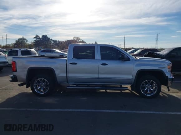 ✅ 2014 GMC Sierra 1500 SLT • VIN: 3GTU2VEC7EG312427 • Lot: 43663488. Listed on IAAI with 101,373 mi. Free auction sales archive from the USA and detailed vehicle history report at DreamBid. Image 13.
