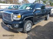 ✅ 2018 GMC Sierra 2500HD Denali • VIN: 1GT12UEG3JF169441 • Lot: 41374700. Listed on IAAI with 102,393 mi. Free auction sales archive from the USA and detailed vehicle history report at DreamBid. Image 2.