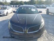 ✅ 2015 Lincoln MKS • VIN: 1LNHL9DK6FG608188 • Lot: 43357436. Listed on IAAI with 143,405 mi. Free auction sales archive from the USA and detailed vehicle history report at DreamBid. Image 12.