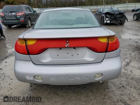 ✅ 2001 Saturn SC • VIN: 1G8ZP12881Z289924 • Лот: 90856305. Опубликован ранее на Copart с пробегом 99 502 миль. Бесплатный доступ к архиву аукционных продаж из США и подробный отчёт об истории автомобиля на DreamBid. Изображение 6.