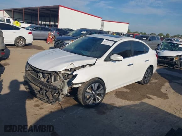 ✅ 2019 Nissan Sentra S • VIN: 3N1AB7AP1KY424804 • Лот: 43393279. Опубликован ранее на IAAI с пробегом 98 989 миль. Бесплатный доступ к архиву аукционных продаж из США и подробный отчёт об истории автомобиля на DreamBid. Изображение 2.
