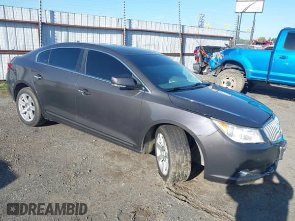 ✅ 2012 Buick LaCrosse Leather • VIN: 1G4GC5E33CF345073 • Lot: 42294945. Listed on IAAI with 104,805 mi. Free auction sales archive from the USA and detailed vehicle history report at DreamBid. Image 1.