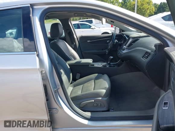 2018 Chevrolet Impala LT z VIN 2G1105S3XJ9170262, wystawiony jako IAAI lot #42963598 z przebiegiem 163 813 mil mil oraz . Historia ofert i sprzedaży dostępna na DreamBid. Obrazek 5.