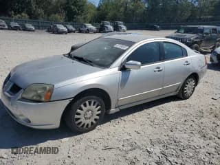 ✅ 2005 Mitsubishi Galant ES • VIN: 4A3AB36F75E054334 • Lot: 82189855. Wystawiony na Copart z przebiegiem 189 607 mil. Bezpłatny archiwum sprzedaży aukcyjnych z USA i szczegółowy raport historii pojazdu na DreamBid. Zdjęcie 1.