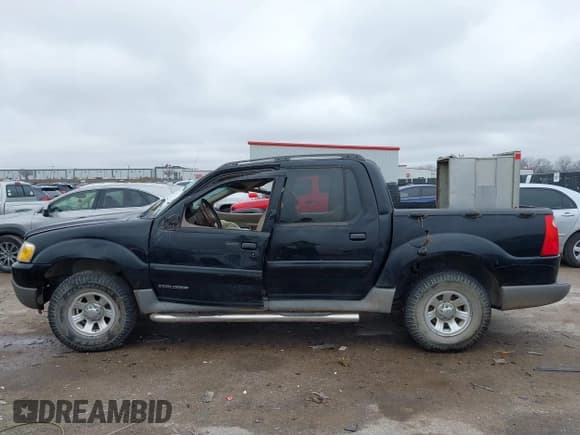 ✅ 2001 Ford Explorer Sport Trac • VIN: 1FMZU67E51UA90784 • Lot: 41557485. Wystawiony na IAAI z przebiegiem 290 670 mil. Bezpłatny archiwum sprzedaży aukcyjnych z USA i szczegółowy raport historii pojazdu na DreamBid. Zdjęcie 14.