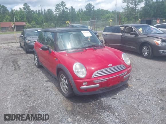 ✅ 2004 MINI Hardtop • VIN: WMWRC33404TJ58399 • Lot: 42431589. Listed on IAAI with 139,580 mi. Free auction sales archive from the USA and detailed vehicle history report at DreamBid. Image 1.