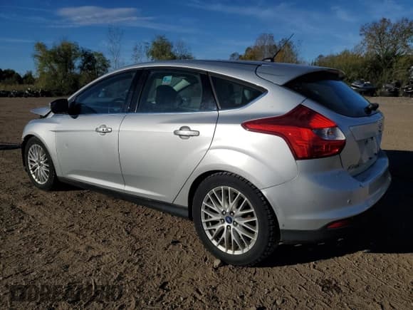 ✅ 2014 Ford Focus Titanium • VIN: 1FADP3N20EL383622 • Lot: 82553195. Listed on Copart with 91,901 mi. Free auction sales archive from the USA and detailed vehicle history report at DreamBid. Image 2.