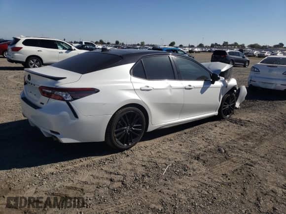 2021 Toyota Camry XSE с VIN 4T1K61AKXMU463805, выставлен на аукционе Copart как лот 90339485 с пробегом 46 702 миль миль и Списание • Salvage title. История ставок и продаж доступна на DreamBid. Изображение 3.
