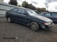 ✅ 1999 Nissan Sentra XE • VIN: 1N4AB41D0XC720162 • Лот: 74484174. Опубликован ранее на Copart с пробегом 186 031 миль. Бесплатный доступ к архиву аукционных продаж из США и подробный отчёт об истории автомобиля на DreamBid. Изображение 4.