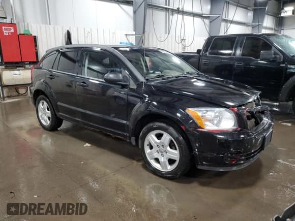 ✅ 2009 Dodge Caliber SXT • VIN: 1B3HB48A49D259194 • Лот: 78402844. Опубликован ранее на Copart с пробегом 164 805 миль. Бесплатный доступ к архиву аукционных продаж из США и подробный отчёт об истории автомобиля на DreamBid. Изображение 4.