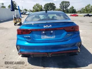 ✅ 2023 Kia Forte GT • VIN: 3KPF44AC1PE620906 • Лот: 71457555. Опубликован ранее на Copart с пробегом 38 478 миль. Бесплатный доступ к архиву аукционных продаж из США и подробный отчёт об истории автомобиля на DreamBid. Изображение 6.