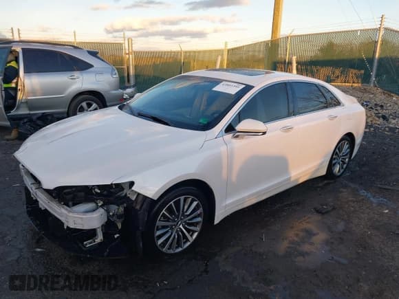 ✅ 2018 Lincoln MKZ Hybrid Select • VIN: 3LN6L5LU2JR608855 • Lot: 43803395. Wystawiony na IAAI z przebiegiem 211 747 mil. Bezpłatny archiwum sprzedaży aukcyjnych z USA i szczegółowy raport historii pojazdu na DreamBid. Zdjęcie 18.