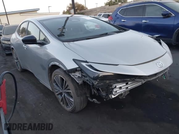 ✅ 2024 Toyota Prius LE • VIN: JTDACAAU2R3021334 • Lot: 43043015. Wystawiony na IAAI z przebiegiem 21 899 mil. Bezpłatny archiwum sprzedaży aukcyjnych z USA i szczegółowy raport historii pojazdu na DreamBid. Zdjęcie 1.