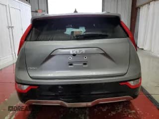 ✅ 2023 Kia Niro Wind • VIN: KNDCR3L15P5053637 • Лот: 63490034. Опубликован ранее на Copart с пробегом 23 662 миль. Бесплатный доступ к архиву аукционных продаж из США и подробный отчёт об истории автомобиля на DreamBid. Изображение 6.