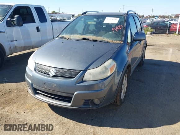✅ 2009 Suzuki SX4 Touring AWD • VIN: JS2YB417895101955 • Лот: 43474185. Опубликован ранее на IAAI с пробегом 185 997 миль. Бесплатный доступ к архиву аукционных продаж из США и подробный отчёт об истории автомобиля на DreamBid. Изображение 2.