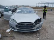 ✅ 2014 Tesla Model S 60 • VIN: 5YJSA1S13EFP63883 • Lot: 42295100. Listed on IAAI with 143,734 mi. Free auction sales archive from the USA and detailed vehicle history report at DreamBid. Image 12.