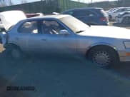 ✅ 1990 Lexus LS • VIN: JT8UF11E9L0025885 • Lot: 41330993. Listed on IAAI with 162,255 mi. Free auction sales archive from the USA and detailed vehicle history report at DreamBid. Image 13.