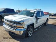 ✅ 2018 Chevrolet Silverado 1500 LT • VIN: 3GCPCREC6JG482791 • Lot: 43519455. Wystawiony na IAAI z przebiegiem 174 730 mil. Bezpłatny archiwum sprzedaży aukcyjnych z USA i szczegółowy raport historii pojazdu na DreamBid. Zdjęcie 2.