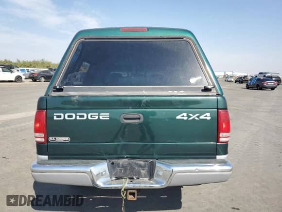 2001 Dodge Dakota Sport z VIN 1B7GG26N81S262671, wystawiony jako Copart lot #71080995 z przebiegiem 145 480 mil mil oraz Szkoda całkowita • Salvage title. Historia ofert i sprzedaży dostępna na DreamBid. Obrazek 6.