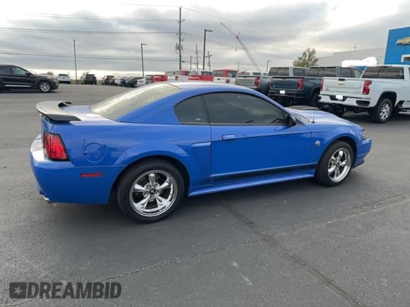 ✅ 2004 Ford Mustang Premium Mach 1 • VIN: 1FAFP42R74F131623 • Lot: 92110565. Listed on Copart with 52,491 mi. Free auction sales archive from the USA and detailed vehicle history report at DreamBid. Image 4.