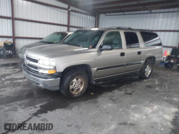 ✅ 2003 Chevrolet Suburban LS • VIN: 3GNEC16Z03G157690 • Lot: 43708192. Listed on IAAI with 425,029 mi. Free auction sales archive from the USA and detailed vehicle history report at DreamBid. Image 2.