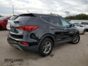 ✅ 2018 Hyundai Santa Fe 2.4L • VIN: 5NMZTDLB3JH077563 • Лот: 65330622. Опубликован ранее на Copart с пробегом 65 169 миль. Бесплатный доступ к архиву аукционных продаж из США и подробный отчёт об истории автомобиля на DreamBid. Изображение 3.