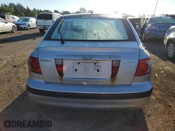 2005 Hyundai Elantra GLS z VIN KMHDN56DX5U150770, wystawiony jako Copart lot #72943264 z przebiegiem 196 876 mil mil oraz Szkoda całkowita • Salvage title. Historia ofert i sprzedaży dostępna na DreamBid. Obrazek 6.