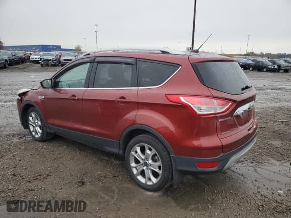 ✅ 2015 Ford Escape Titanium • VIN: 1FMCU9JX6FUA98241 • Lot: 90685515. Listed on Copart with 128,685 mi. Free auction sales archive from the USA and detailed vehicle history report at DreamBid. Image 2.