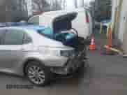 2022 Toyota Camry LE with VIN 4T1R11BKXNU066513, listed as a IAAI auction lot 41324509 with 19,488 mi miles and . Bid and sale history available at DreamBid. Image 16.