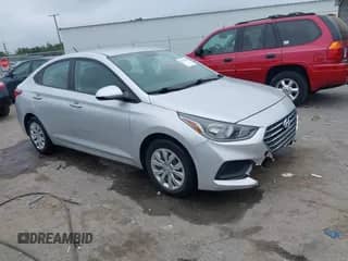 2022 Hyundai Accent SEL z VIN 3KPC24A6XNE157454, wystawiony jako IAAI lot #43015407 z przebiegiem 94 500 mil mil oraz . Historia ofert i sprzedaży dostępna na DreamBid. Obrazek 1.