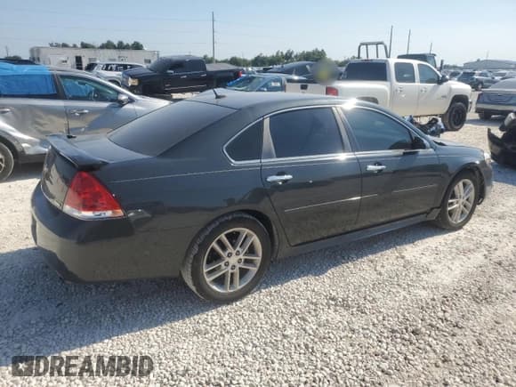 ✅ 2014 Chevrolet Impala LTZ • VIN: 2G1WC5E32E1108674 • Лот: 66052474. Опубликован ранее на Copart с пробегом 216 788 миль. Бесплатный доступ к архиву аукционных продаж из США и подробный отчёт об истории автомобиля на DreamBid. Изображение 3.