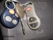 ✅ 1999 Jeep Grand Cherokee Laredo • VIN: 1J4GW58S1XC779363 • Лот: 42492609. Опубликован ранее на IAAI с пробегом 168 820 миль. Бесплатный доступ к архиву аукционных продаж из США и подробный отчёт об истории автомобиля на DreamBid. Изображение 11.