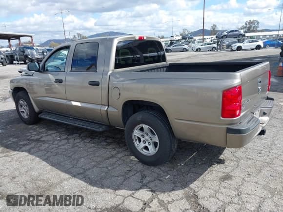 ✅ 2007 Dodge Dakota SLT • VIN: 1D7HE48N47S144084 • Лот: 41798243. Опубликован ранее на IAAI с пробегом 190 248 миль. Бесплатный доступ к архиву аукционных продаж из США и подробный отчёт об истории автомобиля на DreamBid. Изображение 3.
