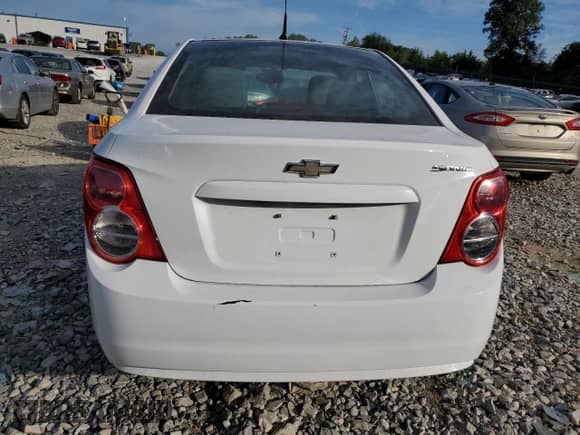 2012 Chevrolet Sonic LS с VIN 1G1JB5SHXC4226373, выставлен на аукционе Copart как лот 69846894 с пробегом 91 631 миль миль и Списание • Salvage title. История ставок и продаж доступна на DreamBid. Изображение 6.