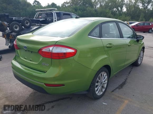 ✅ 2018 Ford Fiesta Titanium • VIN: 3FADP4CJ9JM117668 • Lot: 43281962. Listed on IAAI with 104,716 mi. Free auction sales archive from the USA and detailed vehicle history report at DreamBid. Image 4.