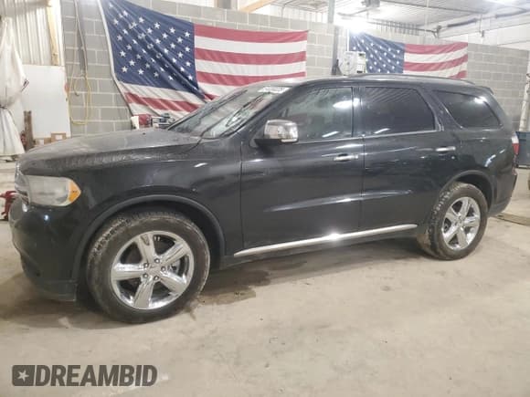 ✅ 2013 Dodge Durango Citadel • VIN: 1C4SDHET3DC667115 • Lot: 51220225. Listed on Copart with 306,138 mi. Free auction sales archive from the USA and detailed vehicle history report at DreamBid. Image 1.