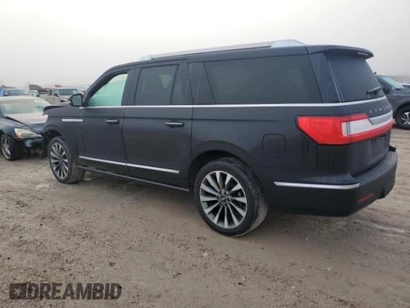 ✅ 2021 Lincoln Navigator Reserve • VIN: 5LMJJ3KT2MEL02854 • Lot: 85067144. Listed on Copart with 91,418 mi. Free auction sales archive from the USA and detailed vehicle history report at DreamBid. Image 2.