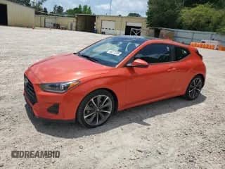 2020 Hyundai Veloster 2.0 с VIN KMHTG6AF3LU022114, выставлен на аукционе Copart как лот 60273395 с пробегом 58 476 миль миль и Списание • Salvage title. История ставок и продаж доступна на DreamBid. Изображение 1.