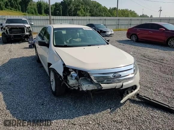 ✅ 2012 Ford Fusion S • VIN: 3FAHP0GA1CR428991 • Лот: 69211585. Опубликован ранее на Copart с пробегом 130 148 миль. Бесплатный доступ к архиву аукционных продаж из США и подробный отчёт об истории автомобиля на DreamBid. Изображение 13.
