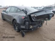 ✅ 2022 Tesla Model 3 Performance • VIN: 5YJ3E1EC2NF259010 • Lot: 43705331. Wystawiony na IAAI z przebiegiem 57 250 mil. Bezpłatny archiwum sprzedaży aukcyjnych z USA i szczegółowy raport historii pojazdu na DreamBid. Zdjęcie 3.