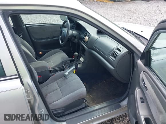 ✅ 2001 Mazda 626 LX • VIN: 1YVGF22C715225501 • Lot: 42210842. Wystawiony na IAAI z przebiegiem 225 546 mil. Bezpłatny archiwum sprzedaży aukcyjnych z USA i szczegółowy raport historii pojazdu na DreamBid. Zdjęcie 5.