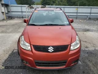✅ 2010 Suzuki SX4 • VIN: JS2YB5A39A6300109 • Lot: 70380944. Listed on Copart with 148,251 mi. Free auction sales archive from the USA and detailed vehicle history report at DreamBid. Image 5.
