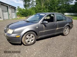 ✅ 2005 Volkswagen Jetta GLS • VIN: 3VWSA69M85M057272 • Lot: 61682495. Listed on Copart with 137,943 mi. Free auction sales archive from the USA and detailed vehicle history report at DreamBid. Image 1.