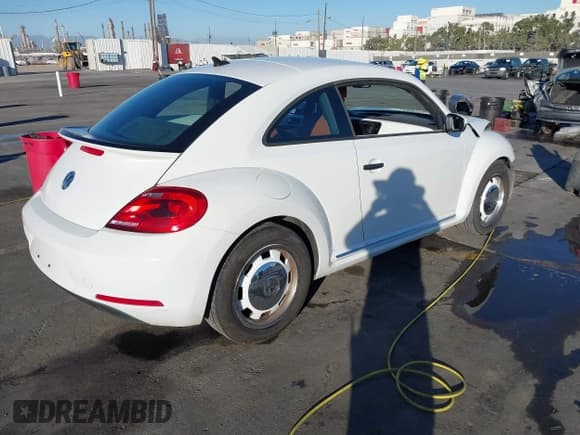 ✅ 2015 Volkswagen Beetle Fleet Edition • VIN: 3VWF17AT2FM604838 • Lot: 40814174. Listed on IAAI with Not provided. Free auction sales archive from the USA and detailed vehicle history report at DreamBid. Image 4.
