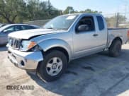 ✅ 2007 Nissan Frontier SE • VIN: 1N6AD06U57C453877 • Lot: 43706315. Listed on IAAI with 148,836 mi. Free auction sales archive from the USA and detailed vehicle history report at DreamBid. Image 2.