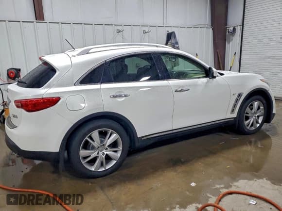 ✅ 2014 Infiniti QX70 • VIN: JN8CS1MW3EM412266 • Lot: 93871145. Listed on Copart with 140,388 mi. Free auction sales archive from the USA and detailed vehicle history report at DreamBid. Image 3.
