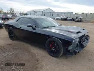 2011 Dodge Challenger SRT-8 z VIN 2B3CJ7DJXBH569153, wystawiony jako IAAI lot #43547248 z przebiegiem 67 886 mil mil oraz . Historia ofert i sprzedaży dostępna na DreamBid. Obrazek 1.