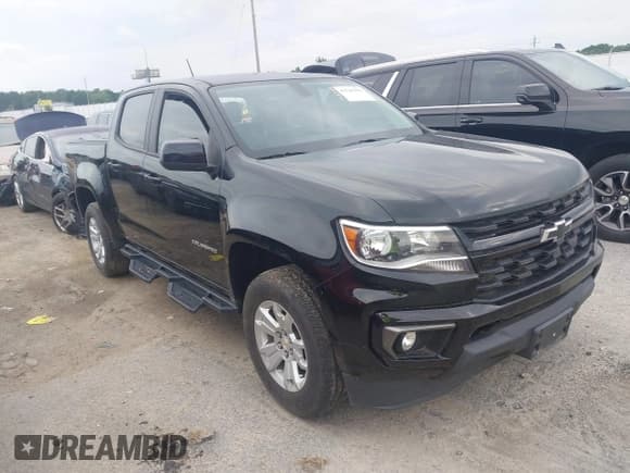 ✅ 2021 Chevrolet Colorado 2WD LT • VIN: 1GCGSCEA6M1273293 • Lot: 42785391. Listed on IAAI with 54,887 mi. Free auction sales archive from the USA and detailed vehicle history report at DreamBid. Image 1.
