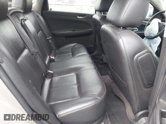 ✅ 2016 Chevrolet Impala LTZ • VIN: 2G1WC5E34G1132915 • Lot: 43325578. Listed on IAAI with 144,317 mi. Free auction sales archive from the USA and detailed vehicle history report at DreamBid. Image 8.